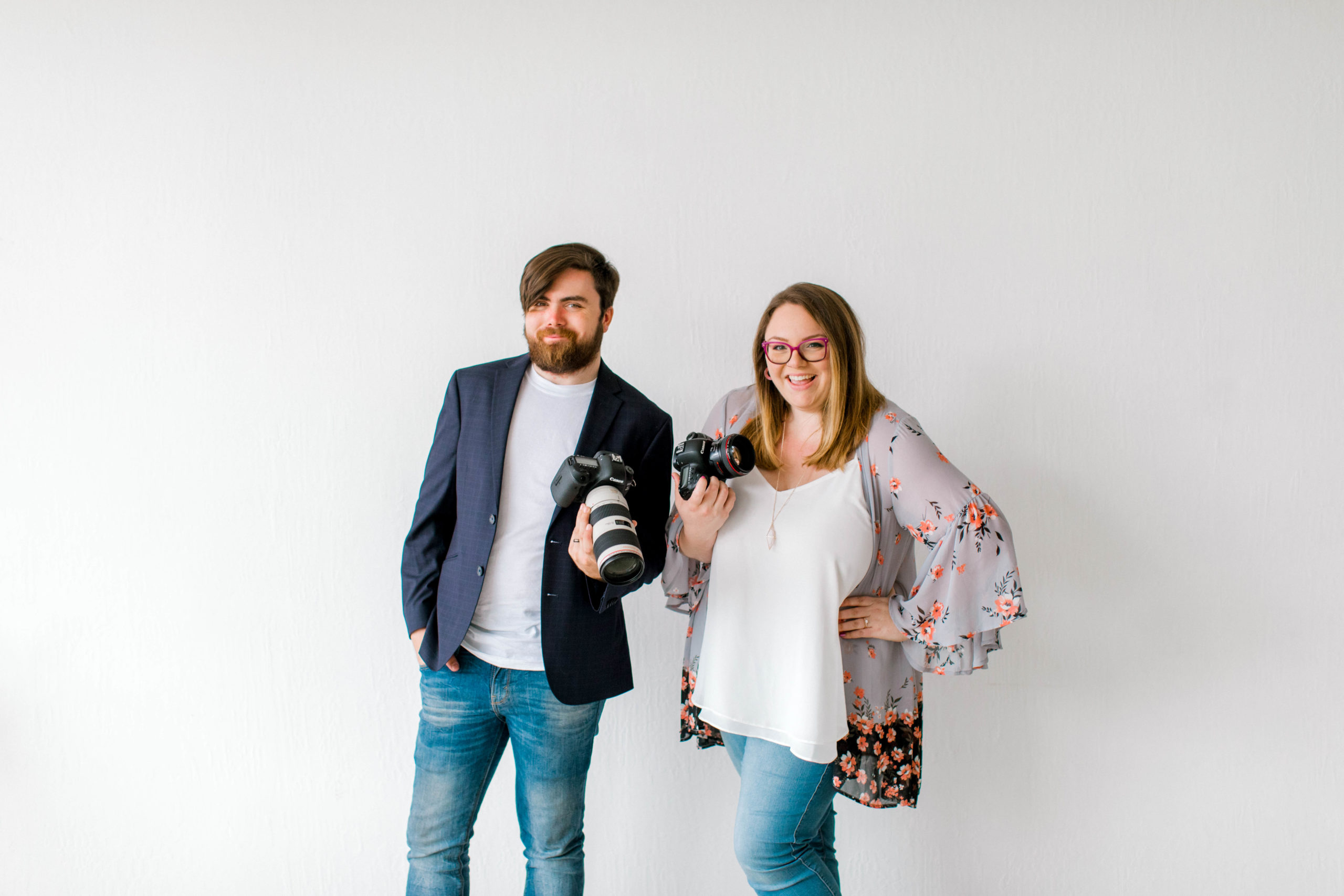 California Wedding Photographers Smiling Holding Cameras