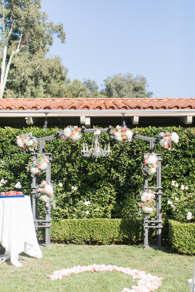 beautiful ceremony arch with flower sprays by Four Seasons Flowers San Diego - Destination wedding photographer - Rancho Bernardo Inn - Angela Sue Photography