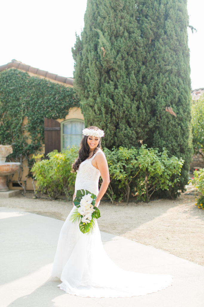 bride standing with tropical bouquet - wedding photo inspiration - Villa Riposo - Angela Sue Photography