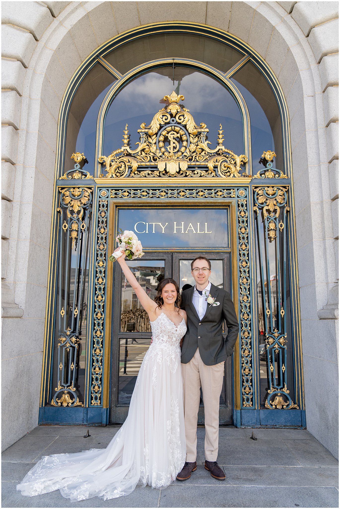 newlyweds cheering outside San Francisco City Hall.